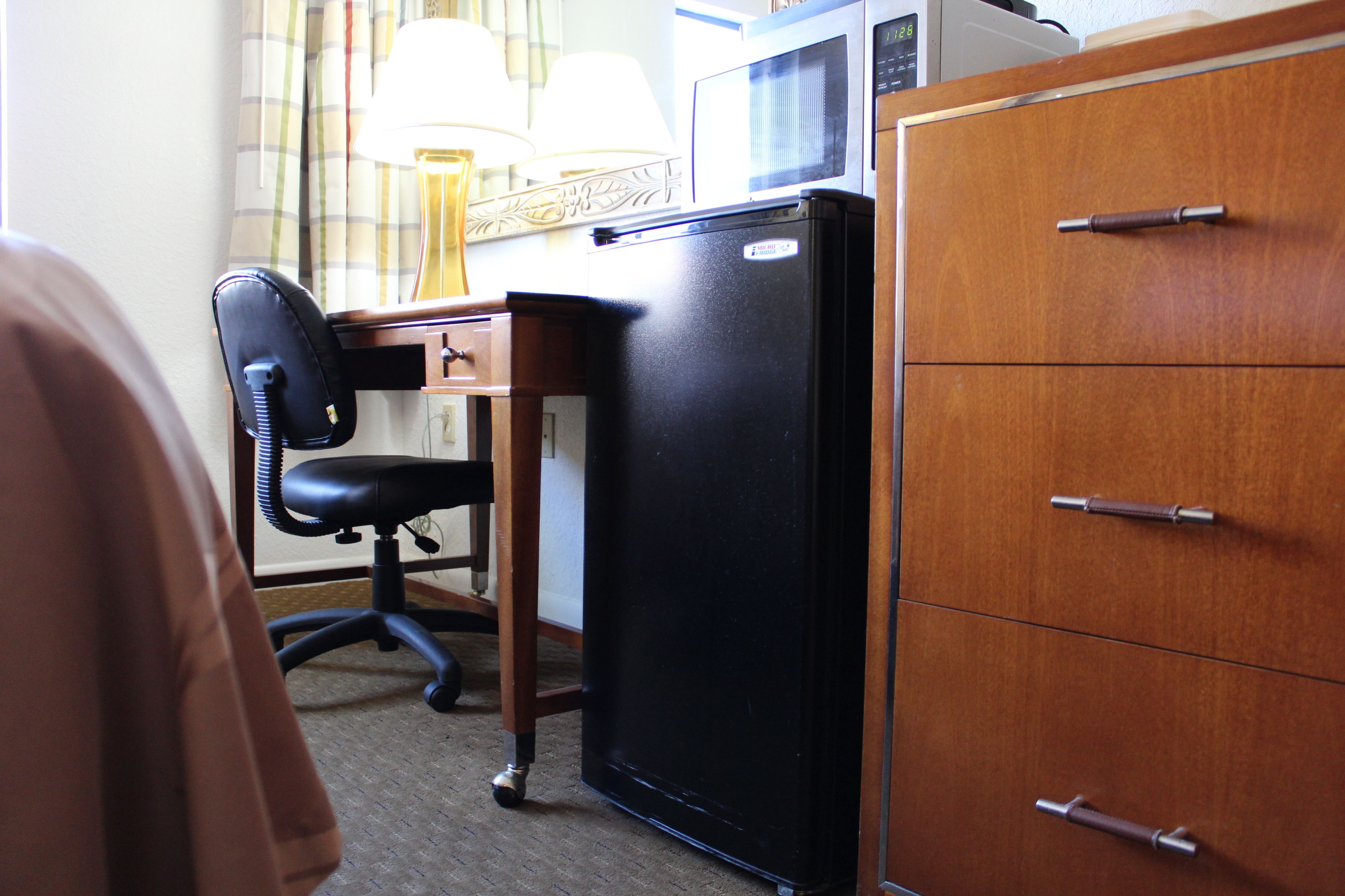 1 king bed, nonsmoking, interior corridor, accessible room, roll-in shower | mini fridge