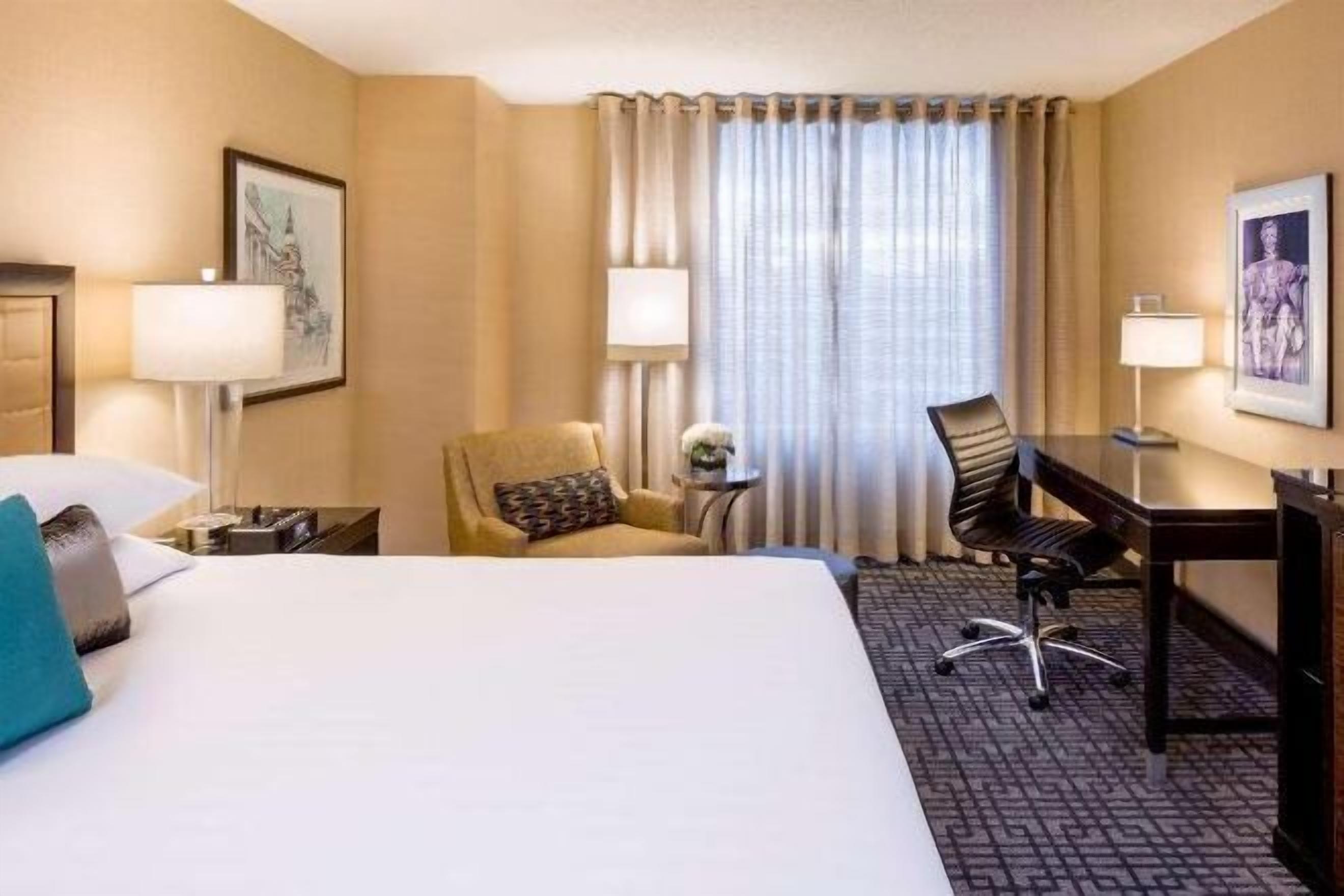 Premium bedding, down duvets, pillow-top beds, in-room safe