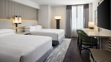 Premium bedding, down duvets, pillow-top beds, in-room safe