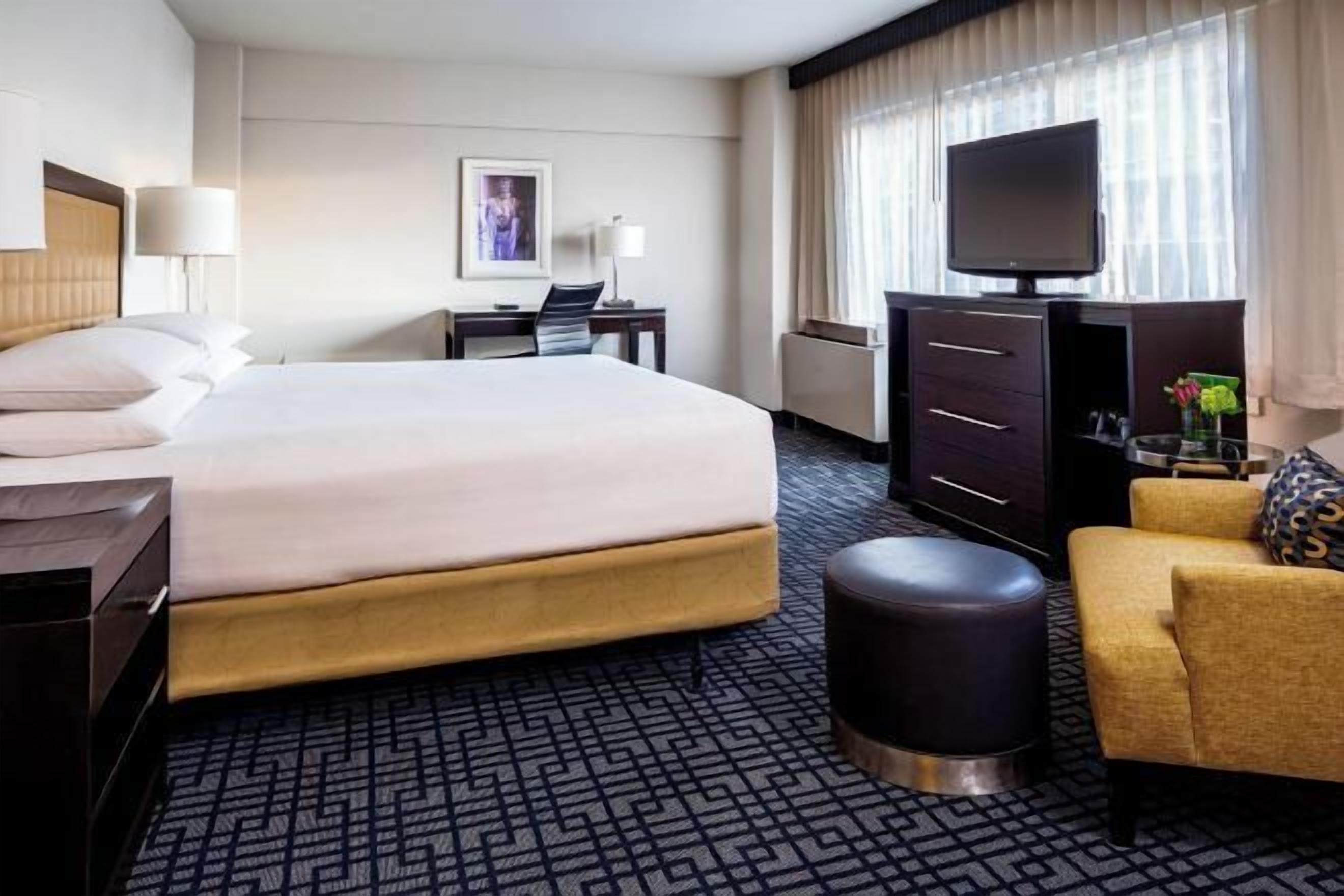 Premium bedding, down comforters, pillowtop beds, in-room safe