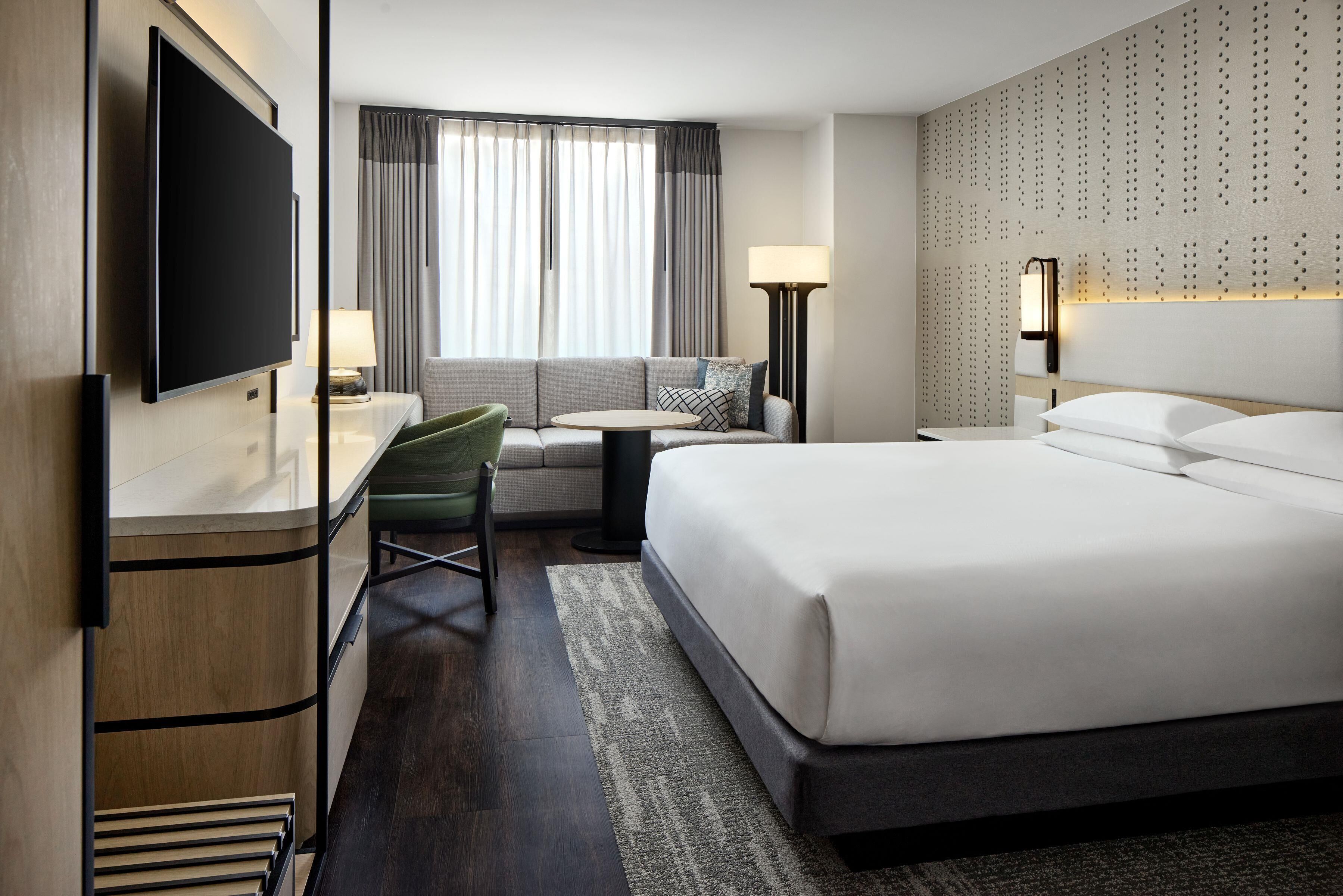 Premium bedding, down comforters, pillowtop beds, in-room safe