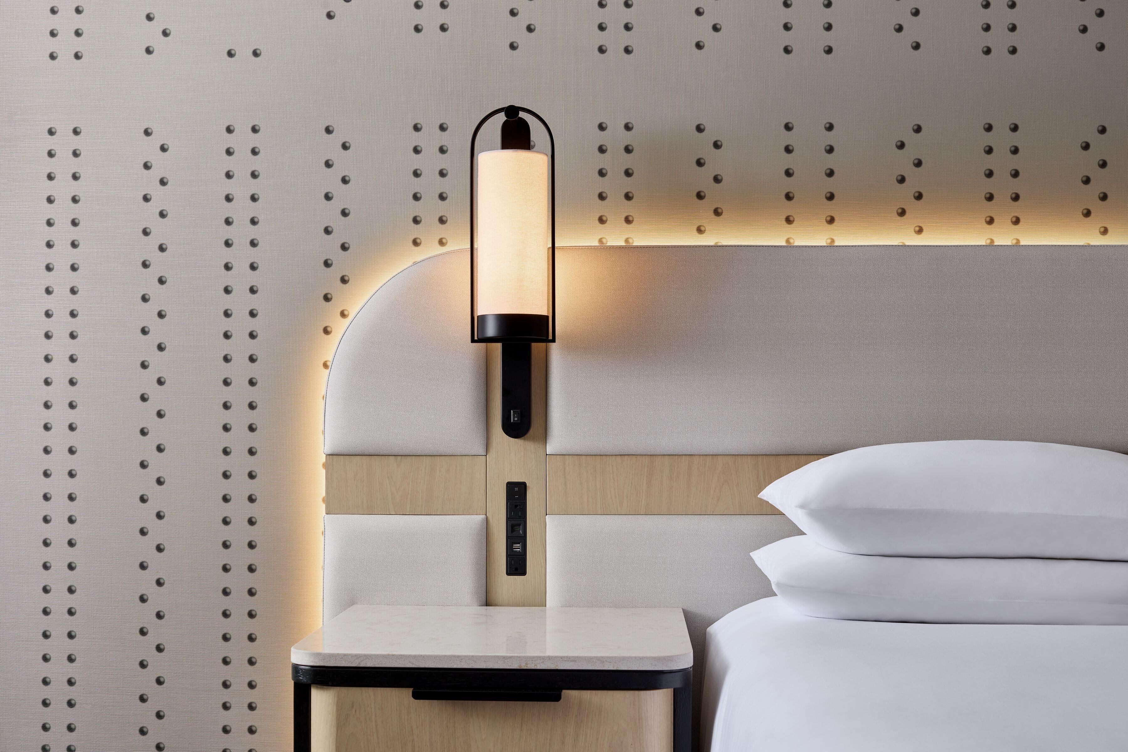 Premium bedding, down comforters, pillowtop beds, in-room safe