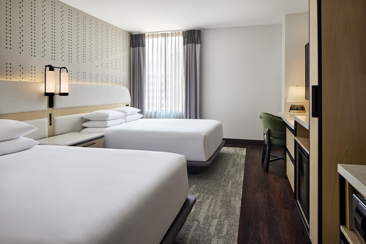 Premium bedding, down comforters, pillowtop beds, in-room safe