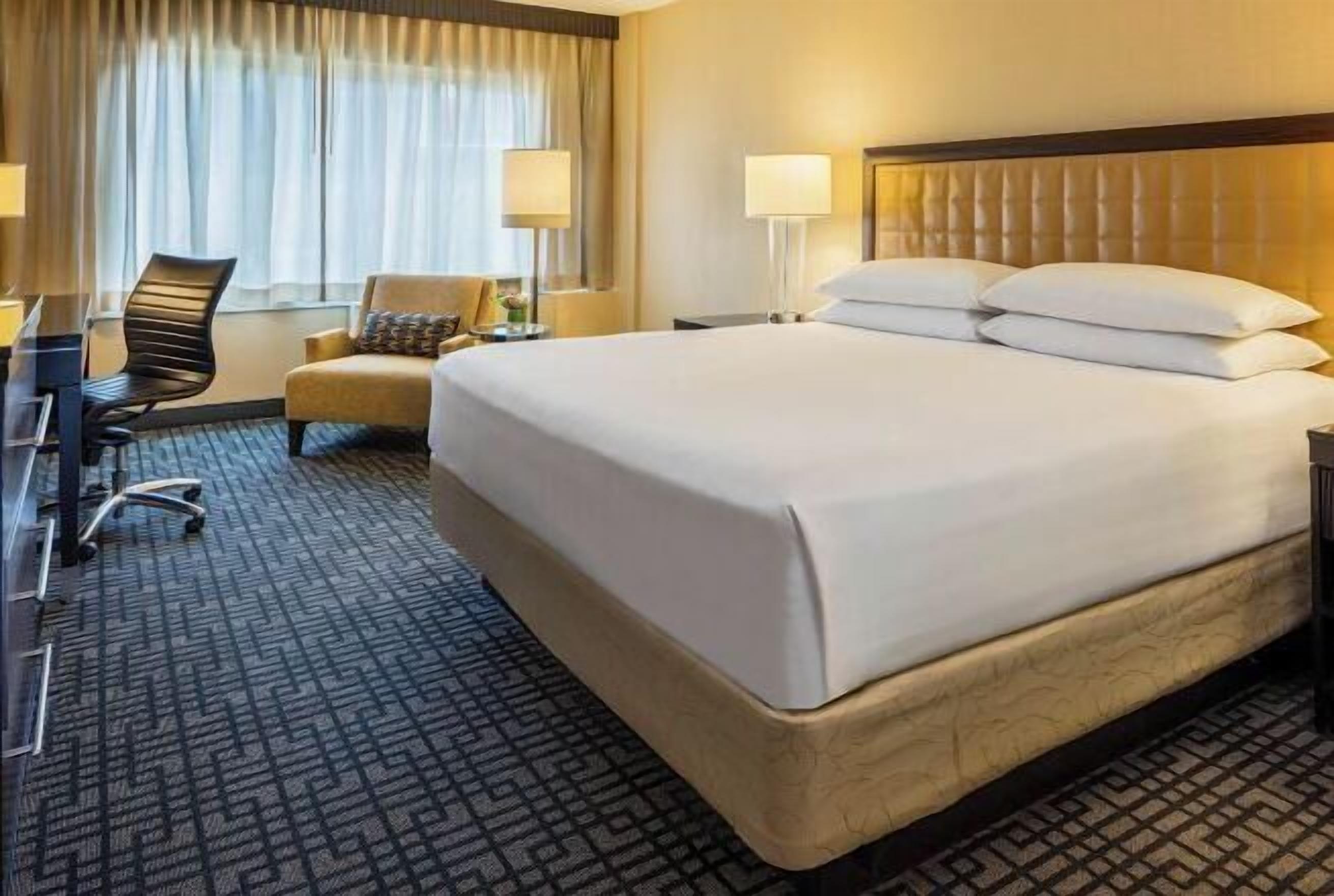 Premium bedding, down comforters, pillowtop beds, in-room safe