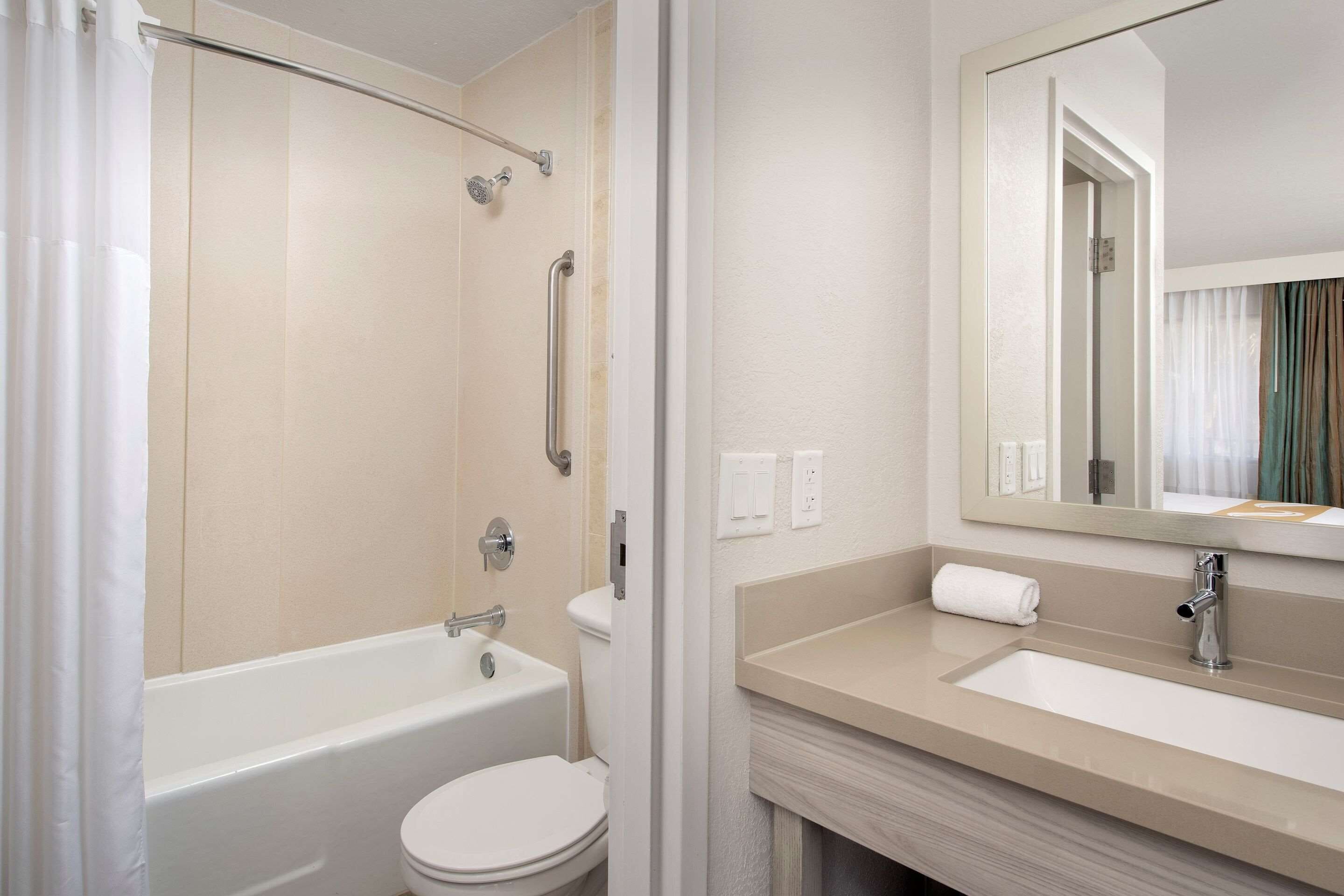 in-room safe, desk, blackout curtains, iron/ironing board