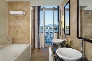 Suite, 1 Bedroom, Balcony | Bathroom | Designer toiletries, hair dryer, bathrobes, slippers - The Ritz-Carlton, Hotel de la Paix, Geneva (Geneva)