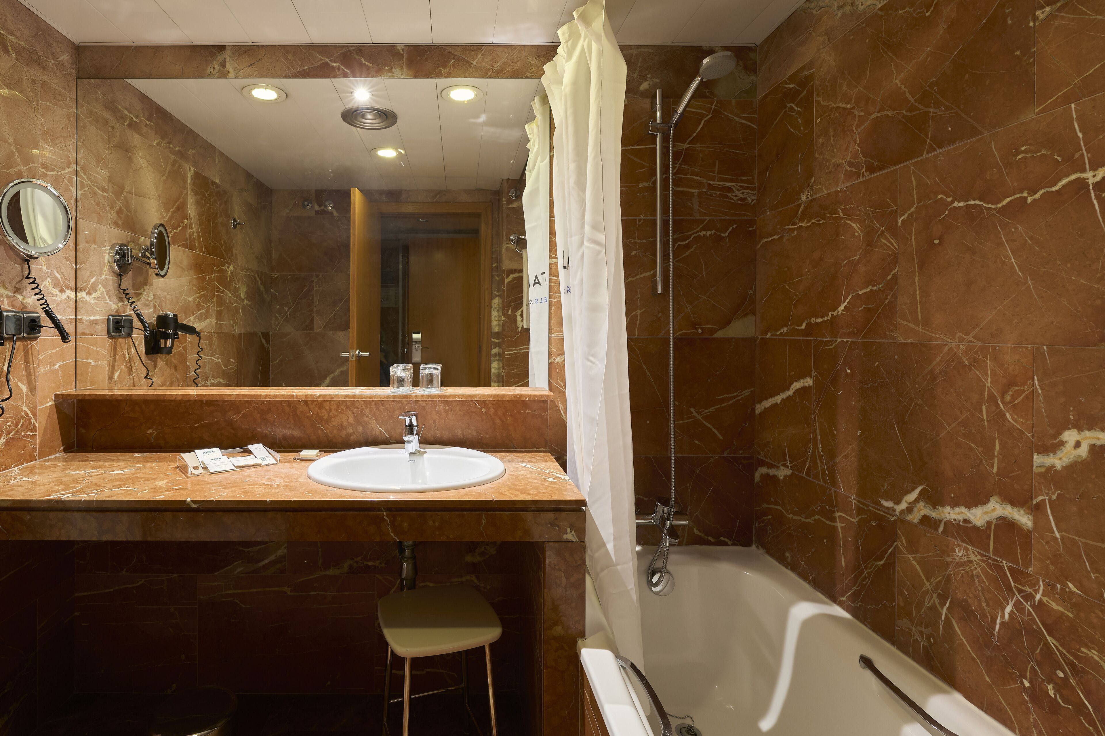 eco-friendly toiletries, hair dryer, towels