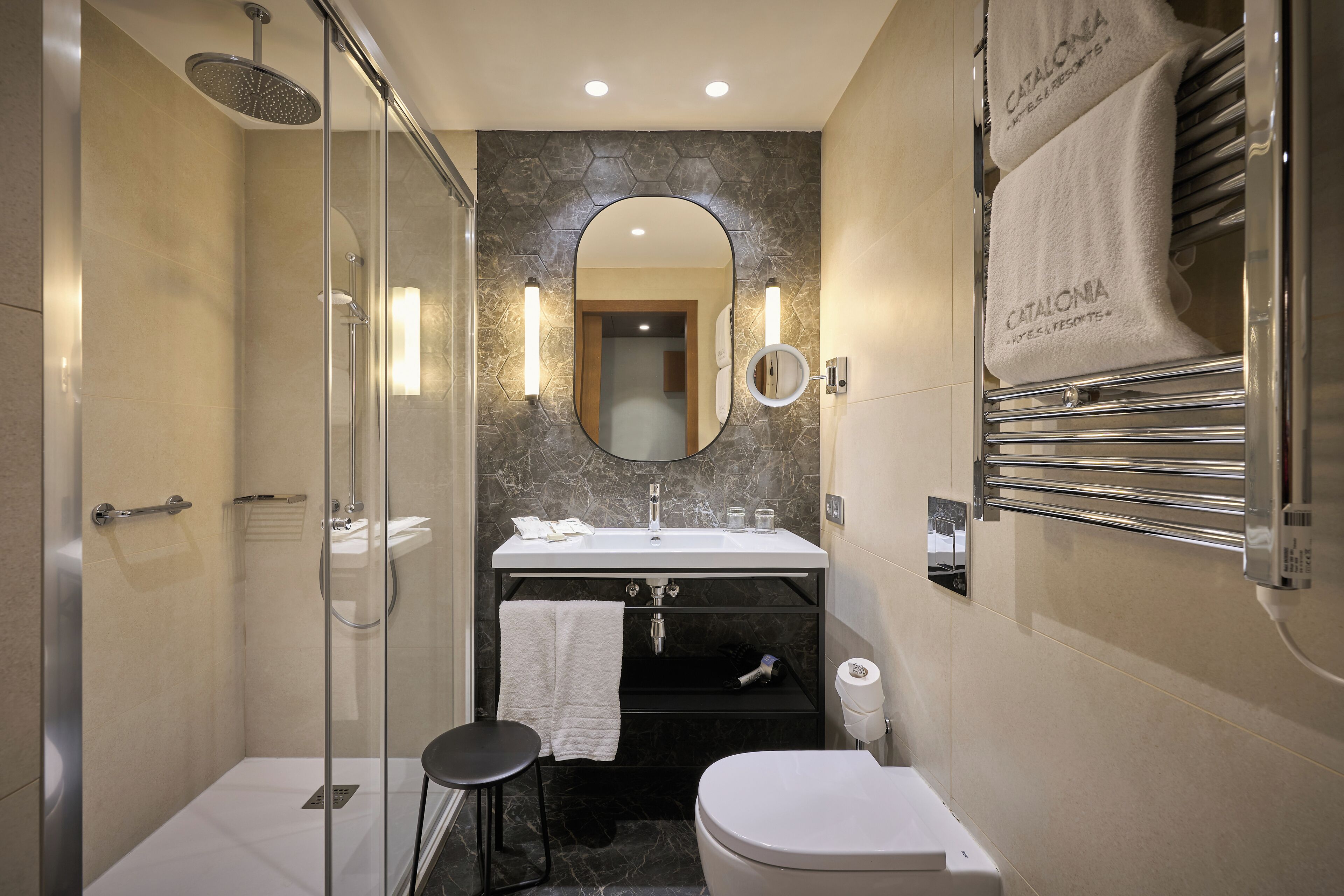 eco-friendly toiletries, hair dryer, towels