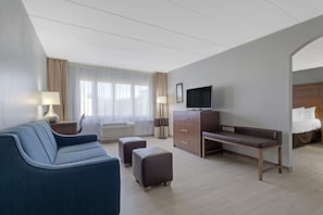 Suite, 1 King Bed, Non Smoking | In-room safe, desk, laptop workspace, iron/ironing board