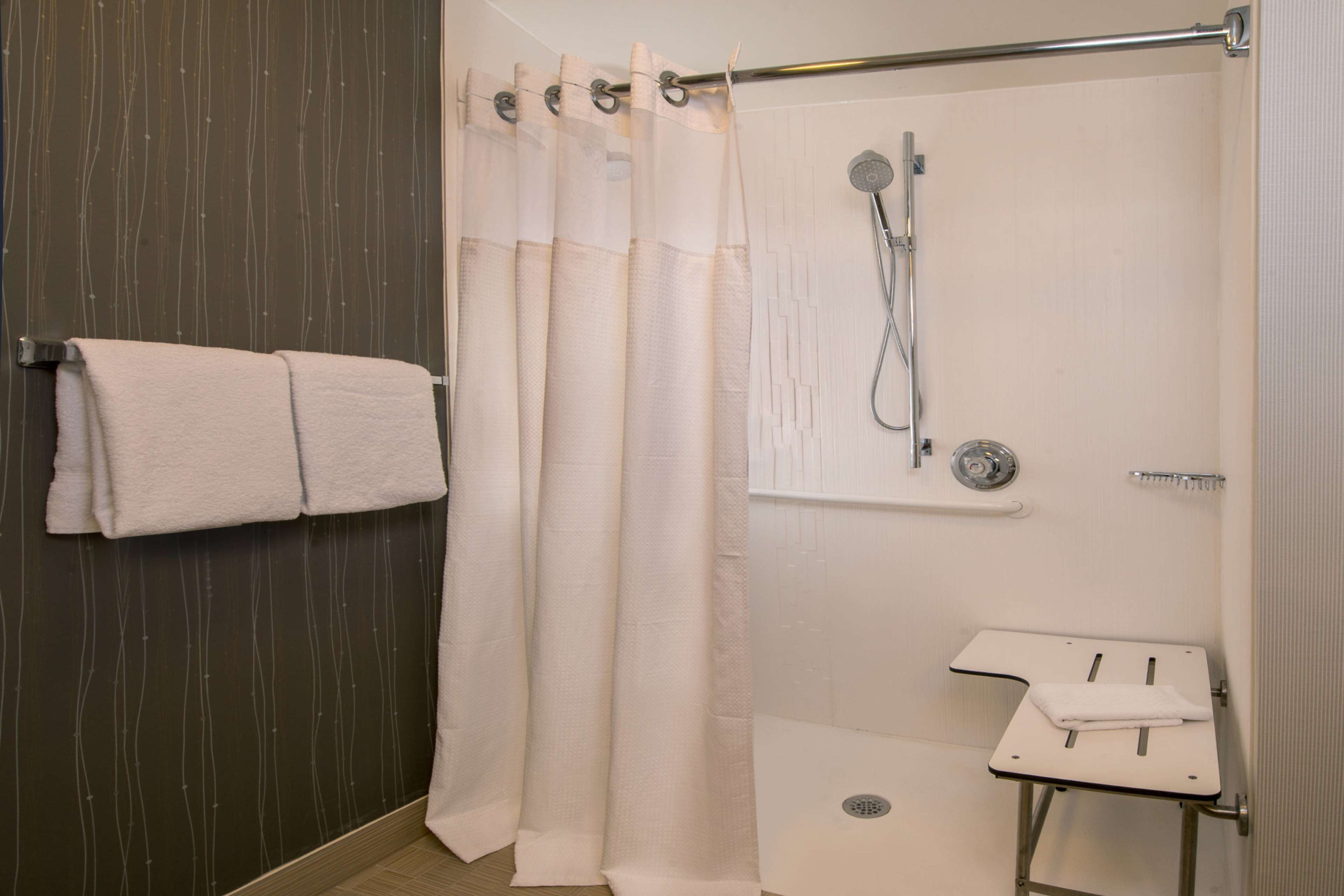combined shower/bathtub, free toiletries, hair dryer, towels
