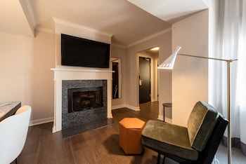 32-inch LCD TV with cable channels, TV, tablet at Claridge House Chicago, Tapestry Collection by Hilton