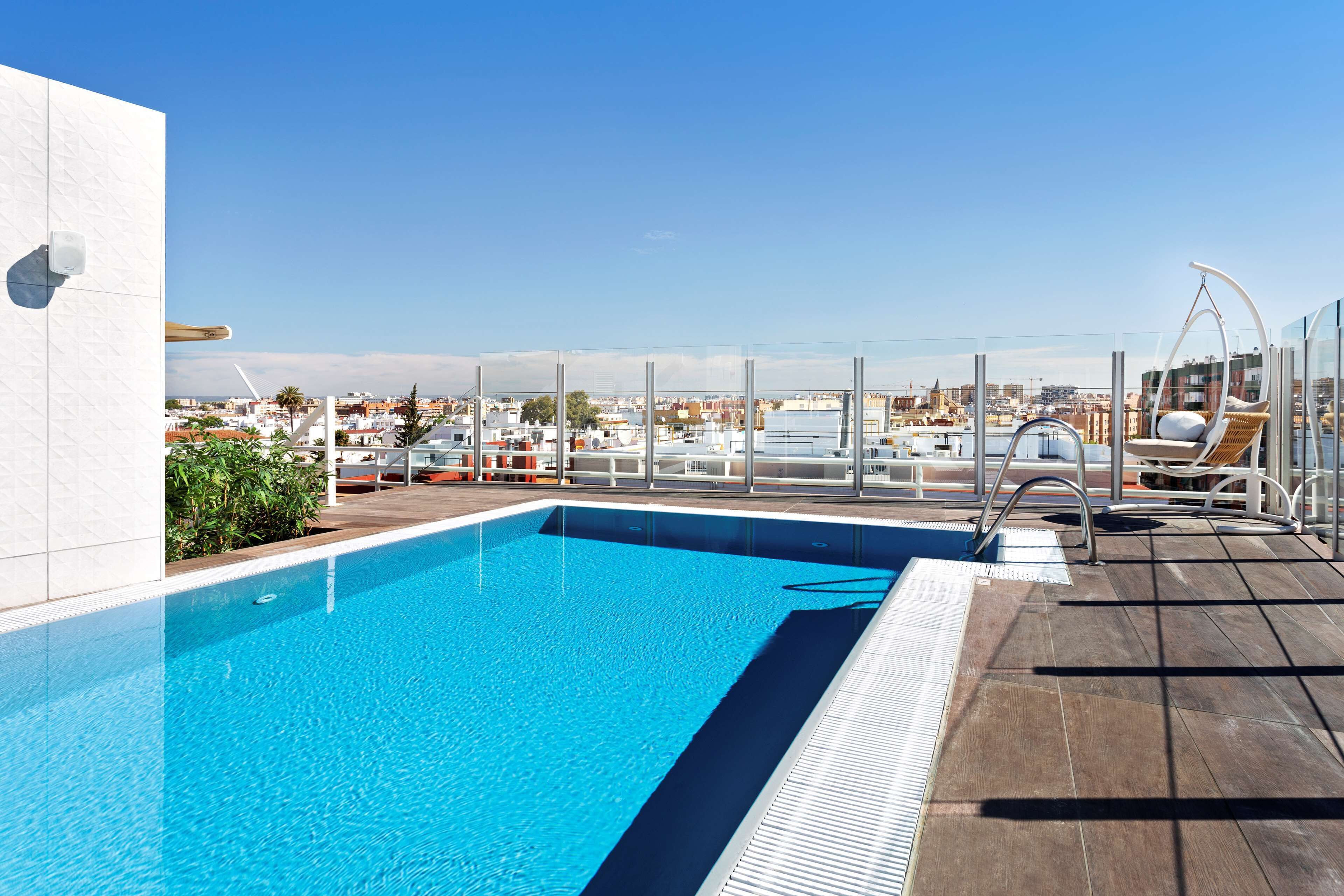 seasonal outdoor pool, pool loungers