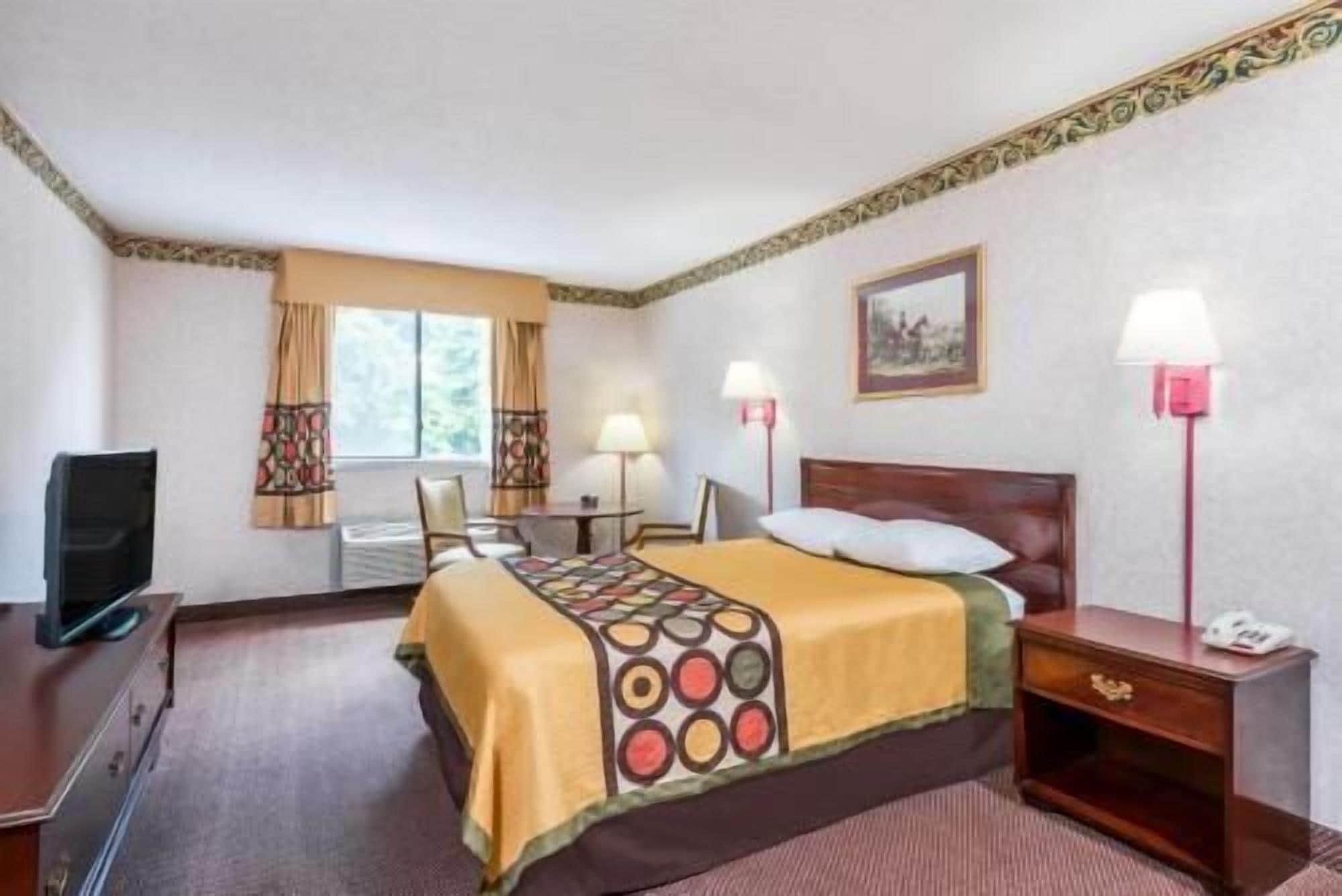 Pillowtop beds, desk, blackout drapes, iron/ironing board