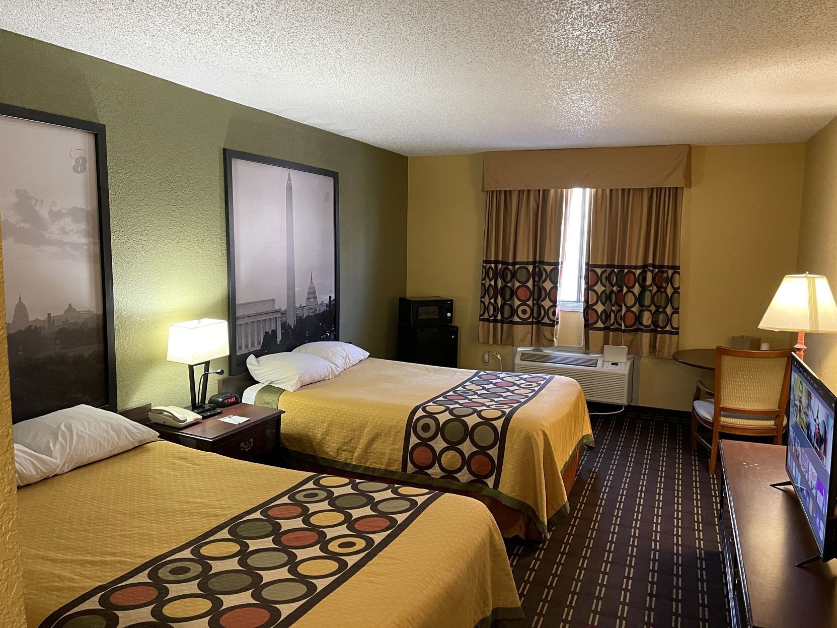 Pillowtop beds, desk, blackout drapes, iron/ironing board