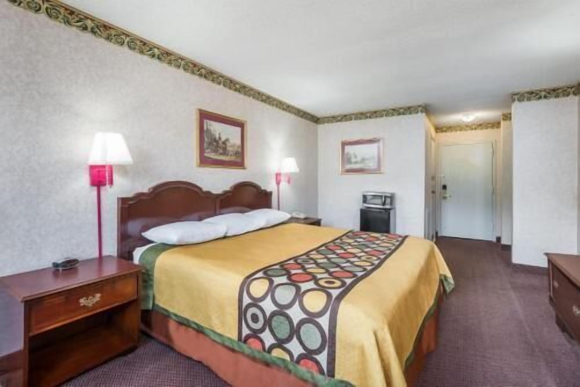 Pillowtop beds, desk, blackout drapes, iron/ironing board