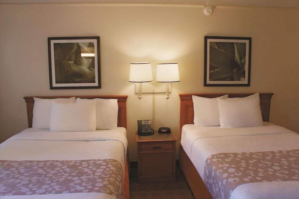 Premium bedding, pillowtop beds, desk, blackout drapes