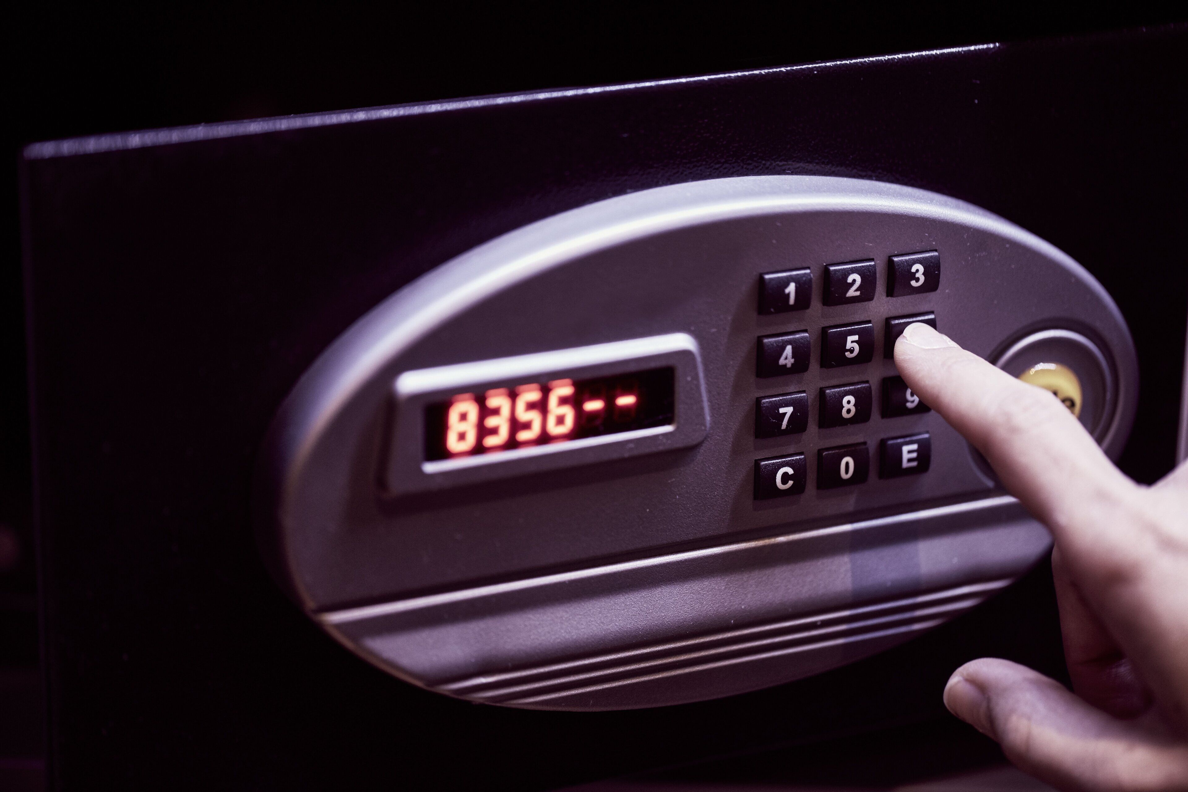 A keypad with a digital display showing the number 8356.