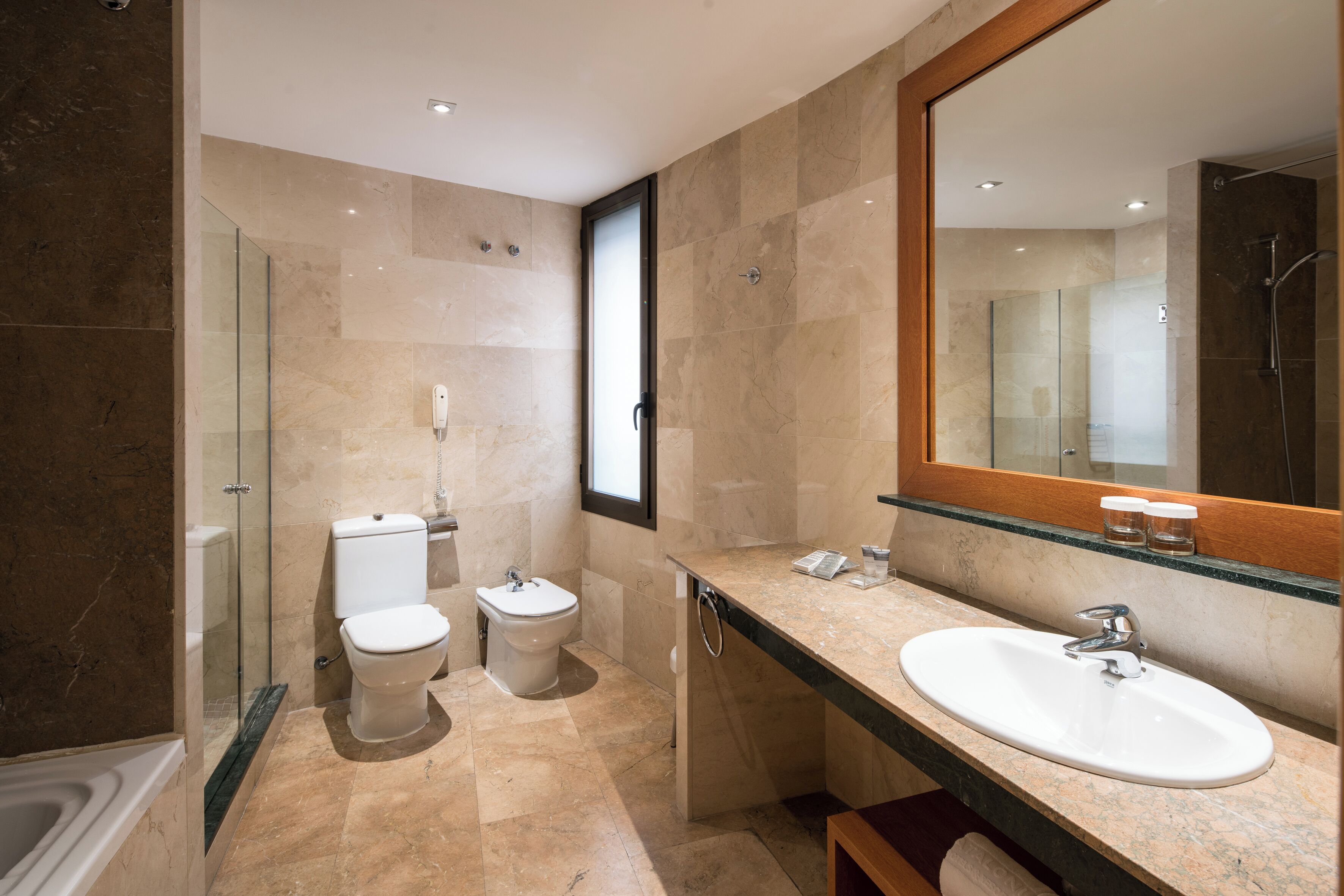 eco-friendly toiletries, hair dryer, towels