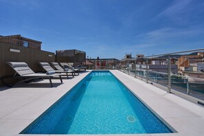 Outdoor pool, sun loungers