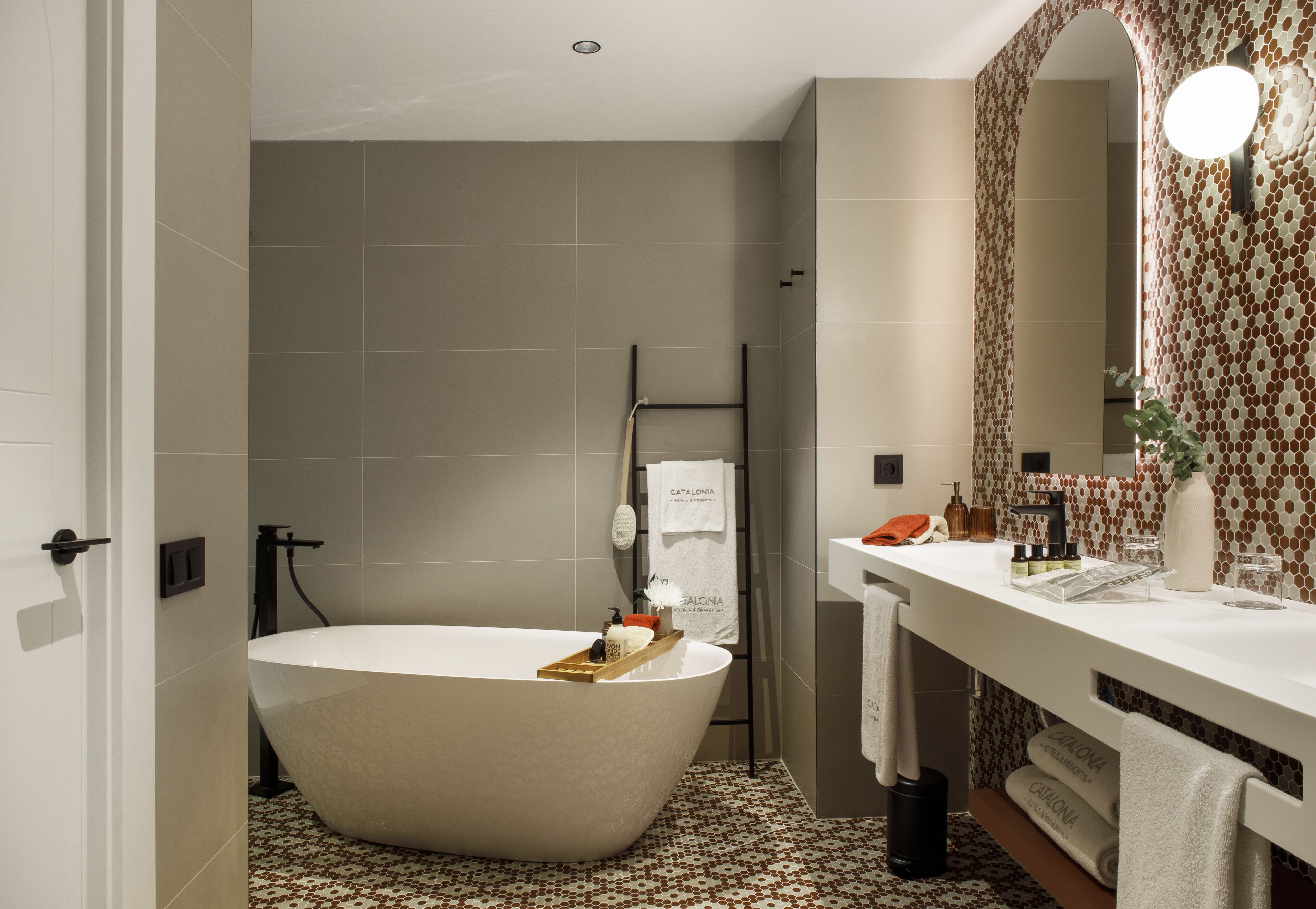 eco-friendly toiletries, hair dryer, towels