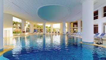 Indoor pool, seasonal outdoor pool, pool umbrellas, pool loungers
