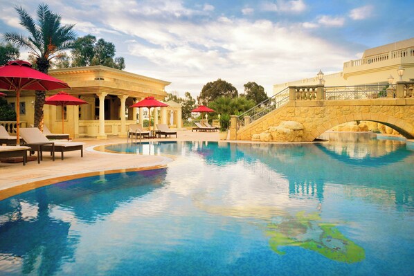 Indoor pool, seasonal outdoor pool, pool umbrellas, pool loungers