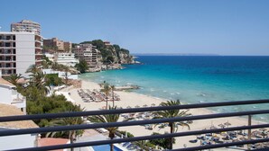 A coastal hotel with a beach view, multiple balconies, and a clear blue sky. - Be Live Experience Costa Palma (Palma de Mallorca)