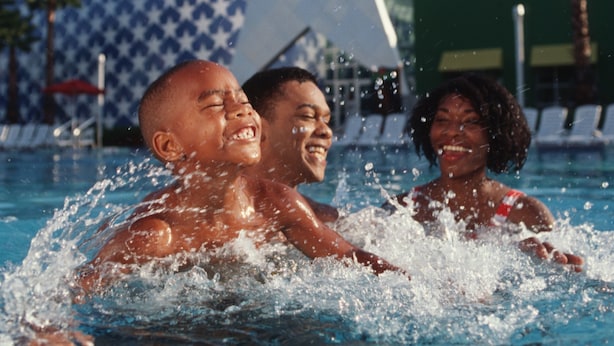 A swimming pool with a large star decoration in the background. - Disney's All Star Sports Resort (Lake Buena Vista)