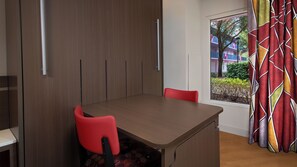 In-room safe, desk, blackout drapes, iron/ironing board - Disney's All Star Sports Resort (Lake Buena Vista)