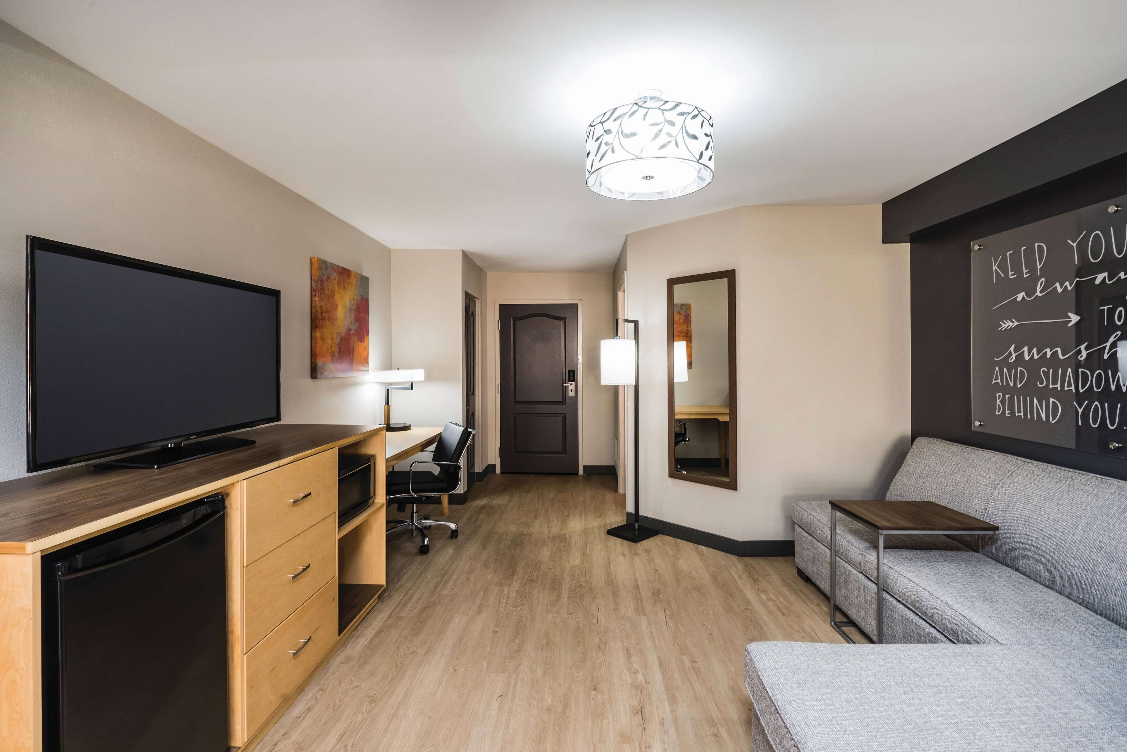 Deluxe Suite, Non Smoking (2 Queen Beds and 1 Sofa Bed) | Hypo-allergenic bedding, down comforters, desk, blackout drapes