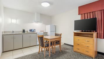 Fridge, microwave, coffee/tea maker, dining tables