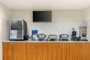 Free daily self-serve breakfast