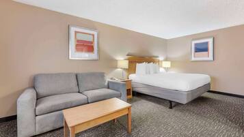 Suite, 1 King Bed, Non Smoking | Premium bedding, individually decorated, individually furnished