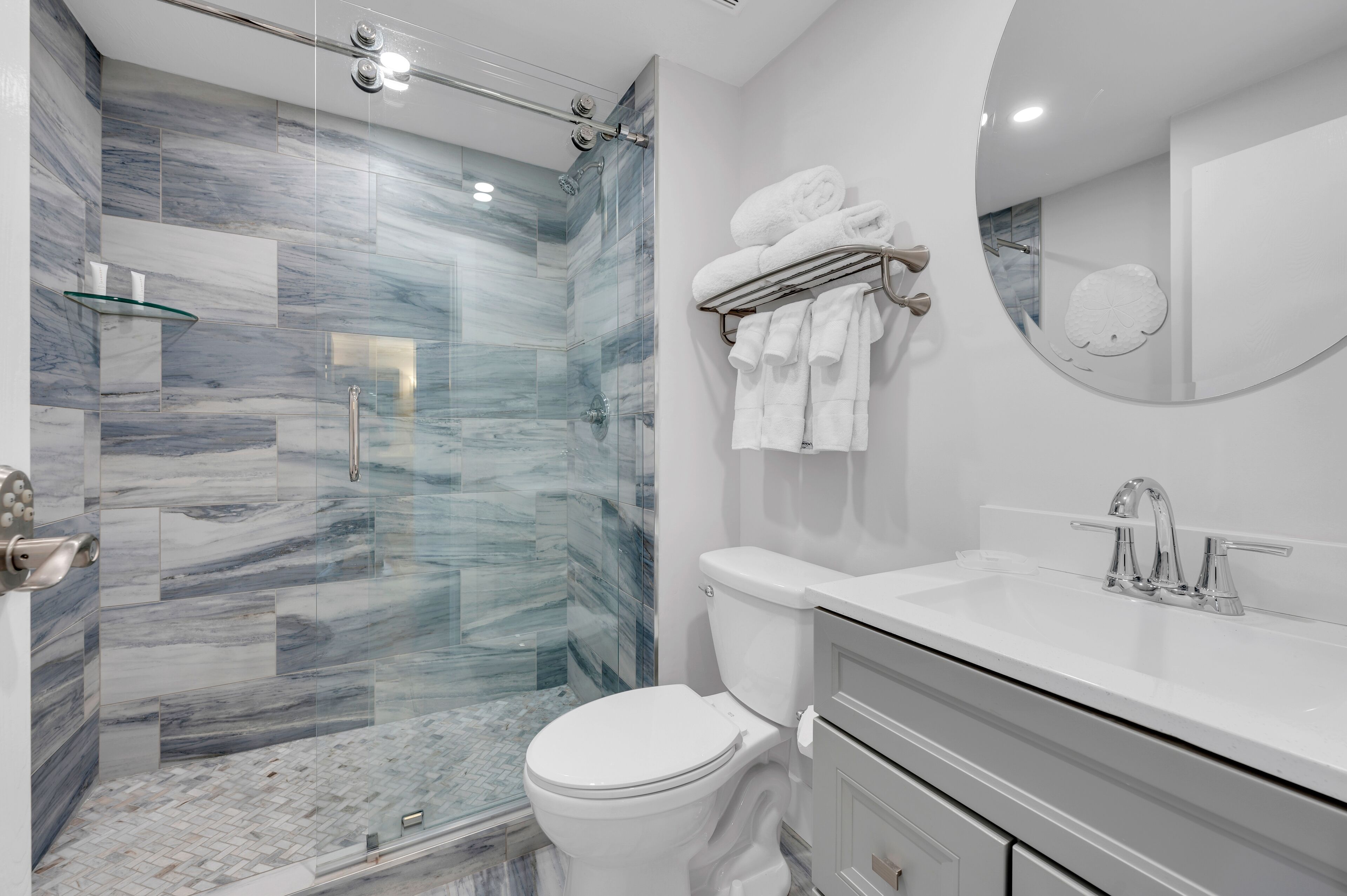 bay view king suite | bathroom | hair dryer, bathrobes, towels