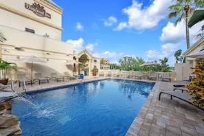 Outdoor pool, open 7:00 AM to 8:00 PM, pool umbrellas, pool loungers
