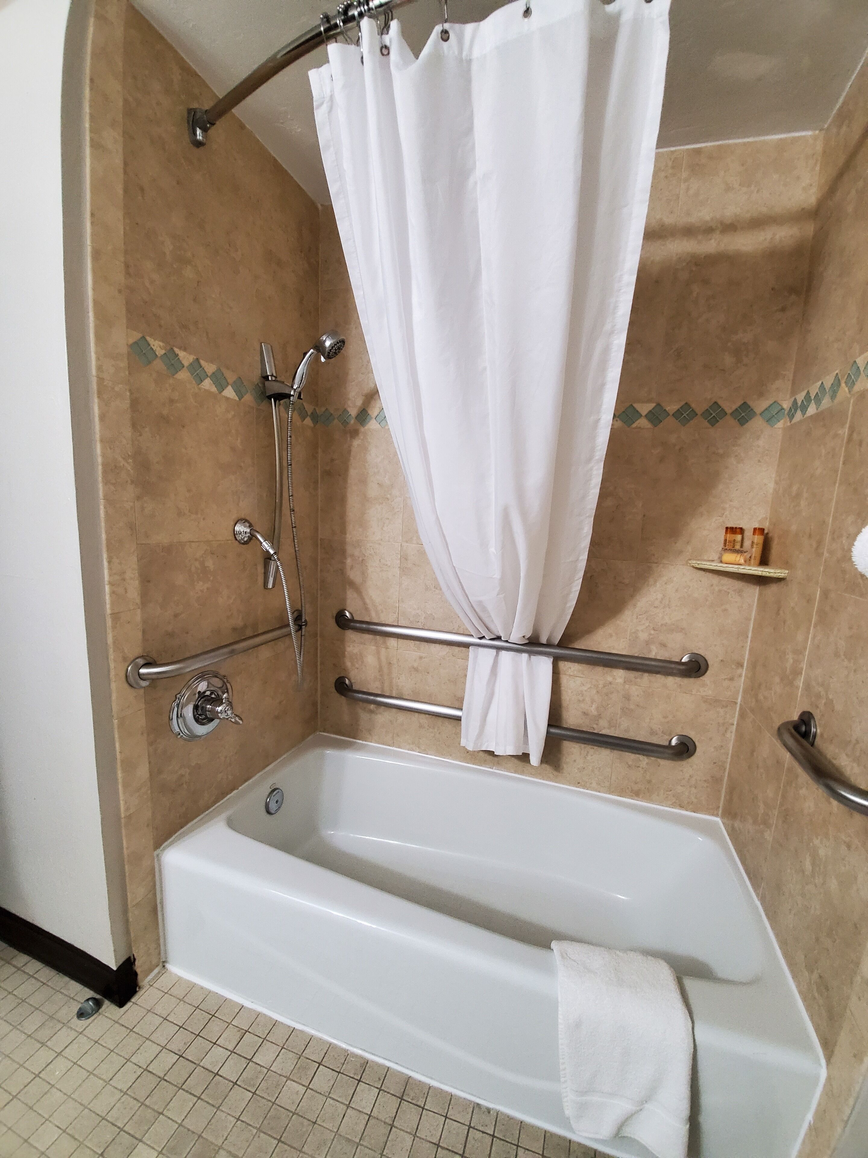 standard room, 1 queen bed, accessible, city view | bathroom | hair dryer, bathrobes, towels