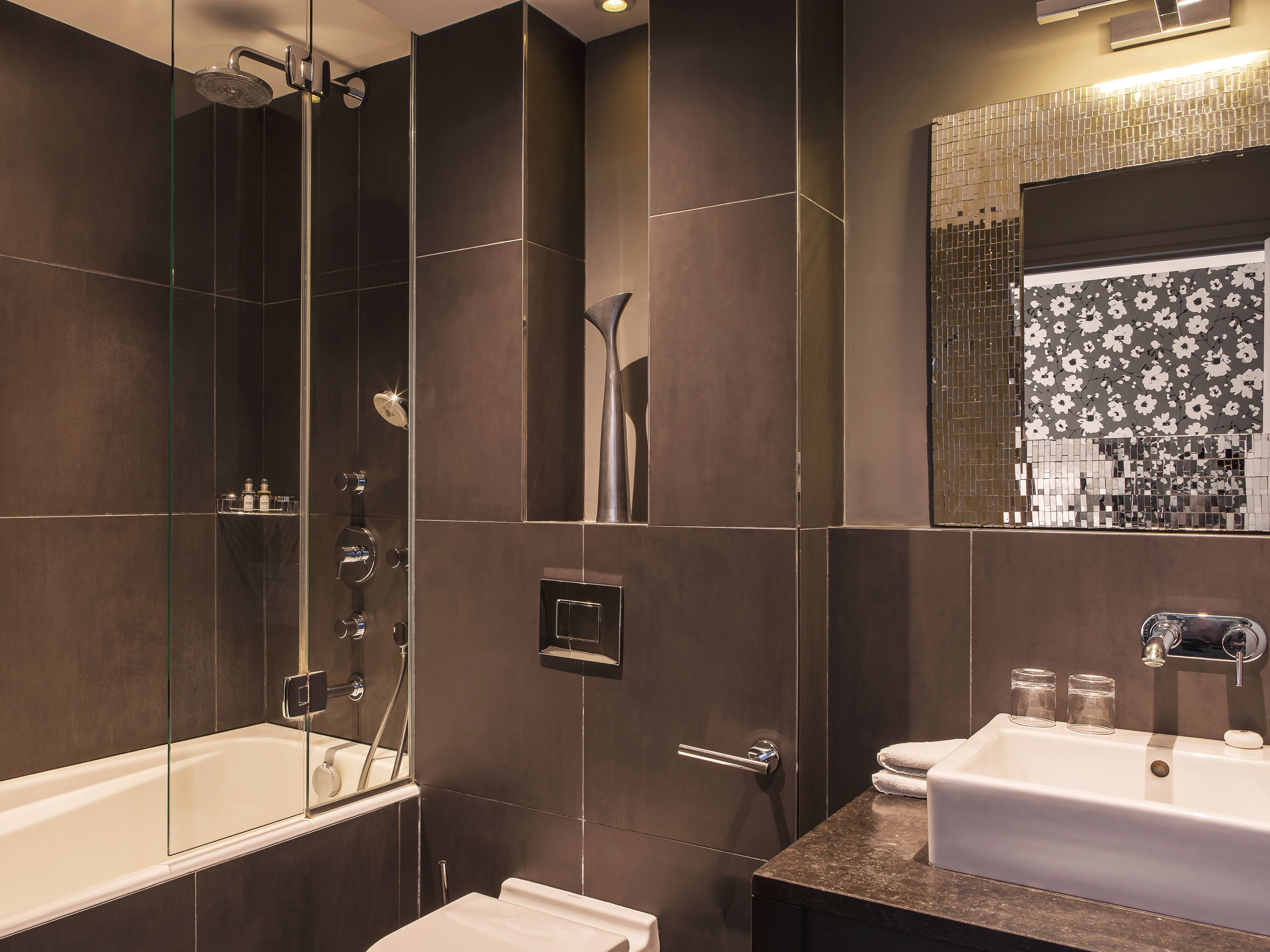 superior room | bathroom | shower, rainfall showerhead, designer toiletries, hair dryer