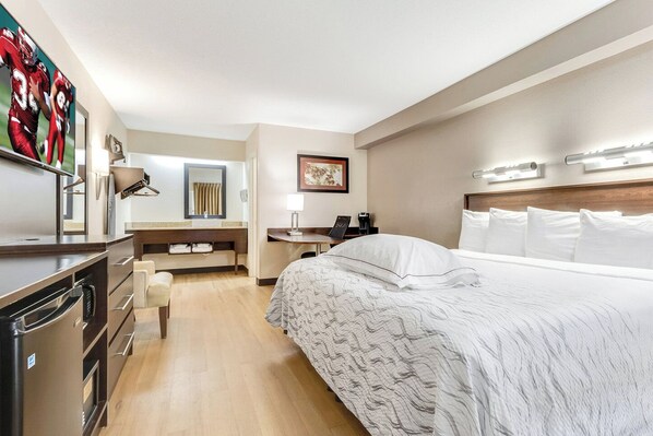 Premium Room, 1 King Bed (Upgraded Bedding & Snack, Smoke Free) | Desk, laptop workspace, blackout drapes, free WiFi