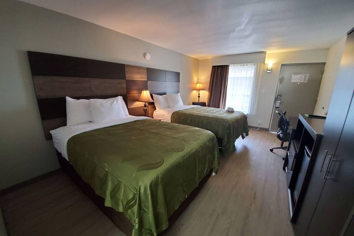 Premium bedding, desk, blackout drapes, iron/ironing board