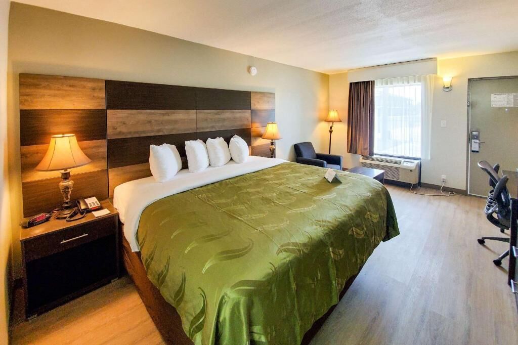 Premium bedding, desk, blackout drapes, iron/ironing board