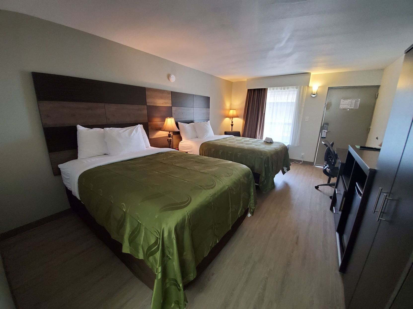Premium bedding, desk, blackout drapes, iron/ironing board
