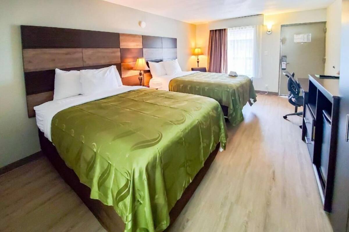 Premium bedding, desk, blackout drapes, iron/ironing board