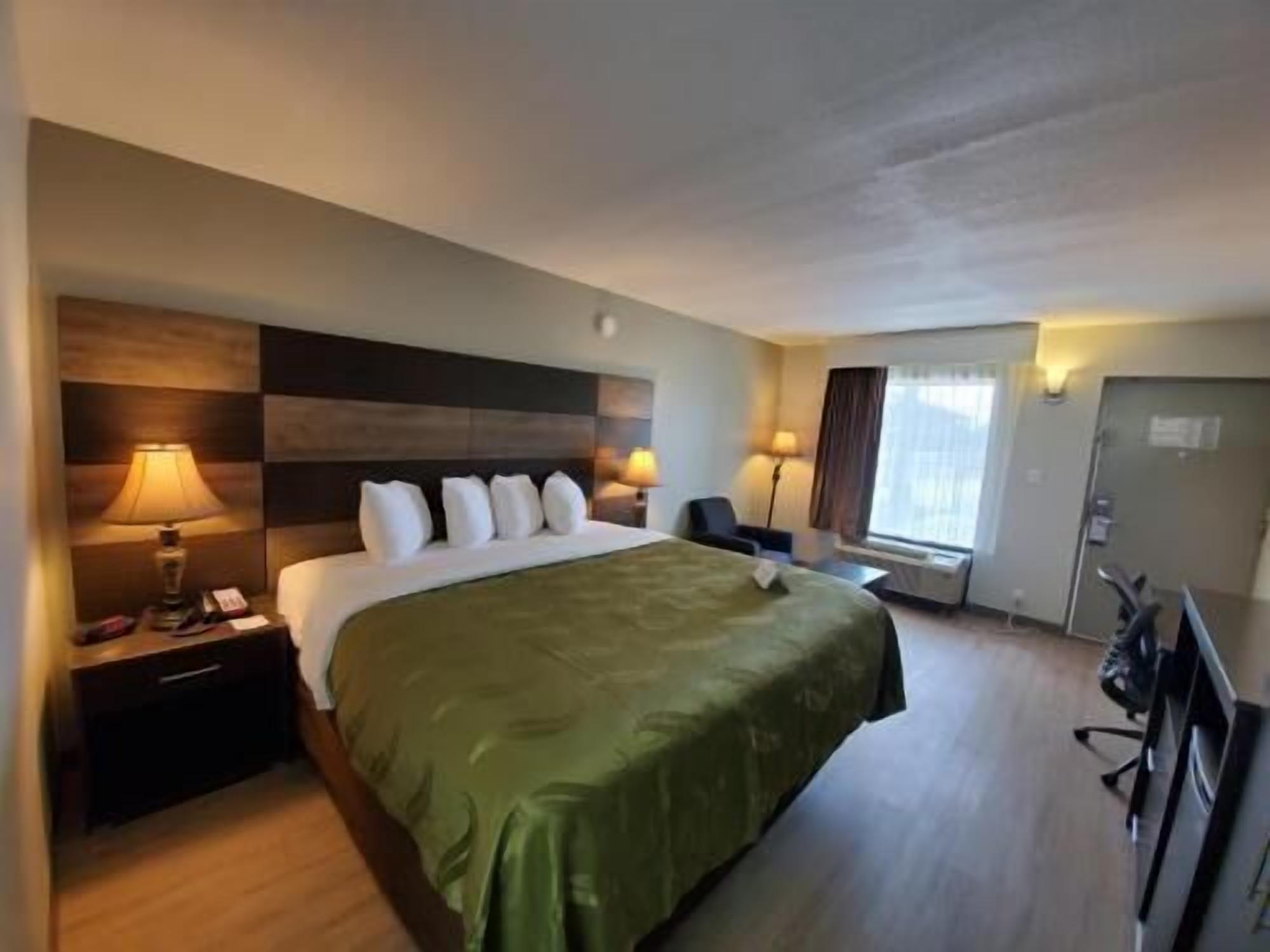 Premium bedding, desk, blackout drapes, iron/ironing board