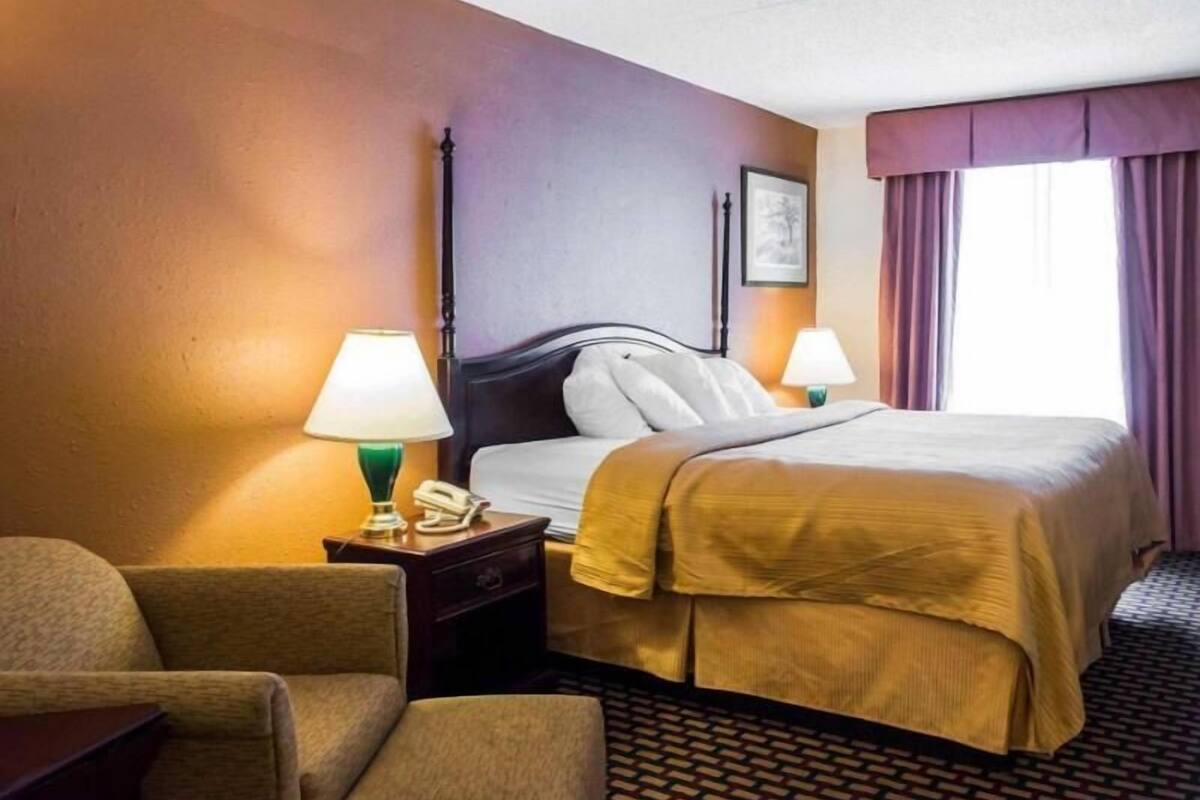 Premium bedding, desk, blackout drapes, iron/ironing board