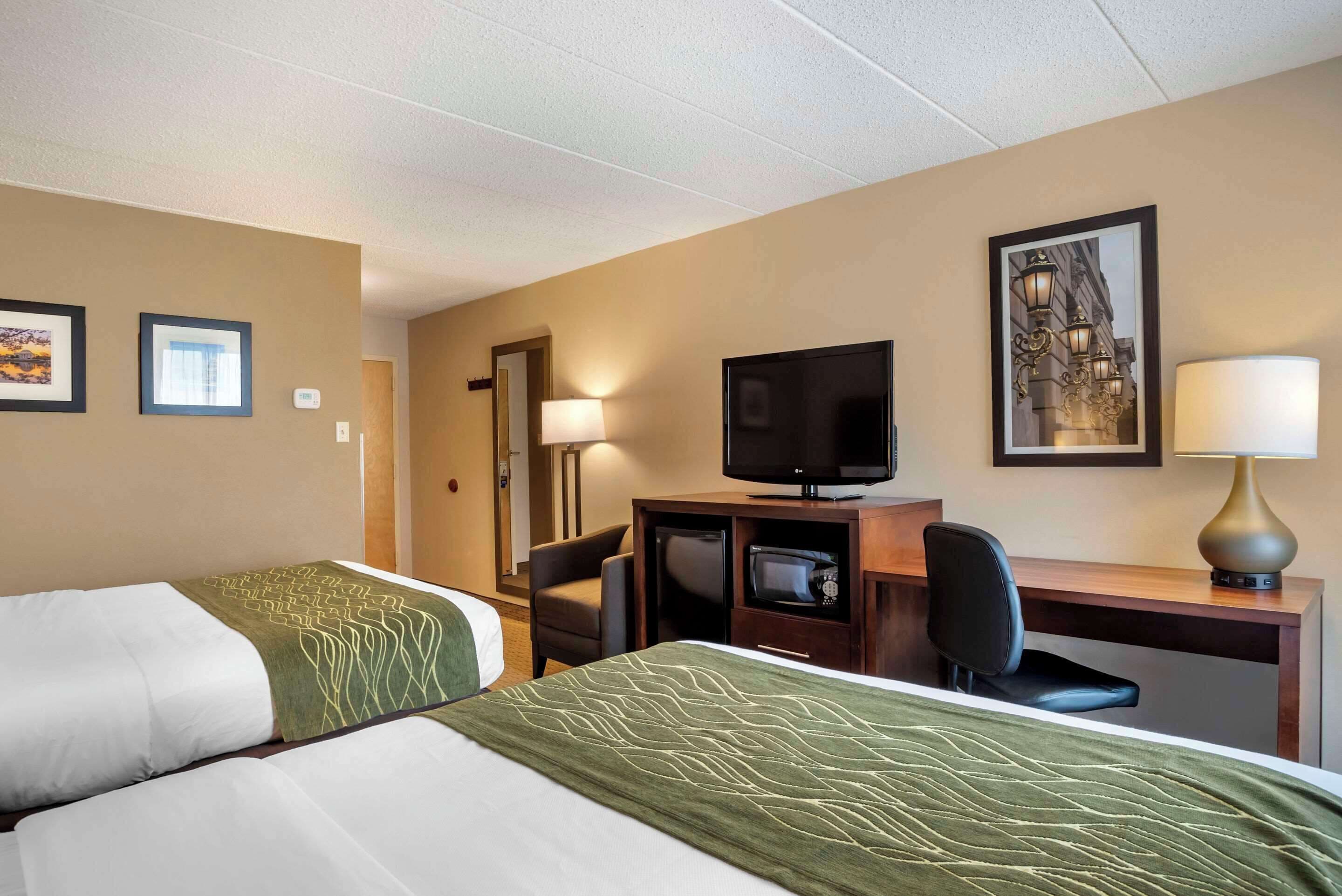 standard room, 2 queen beds, non smoking | in-room safe, desk, laptop workspace, soundproofing