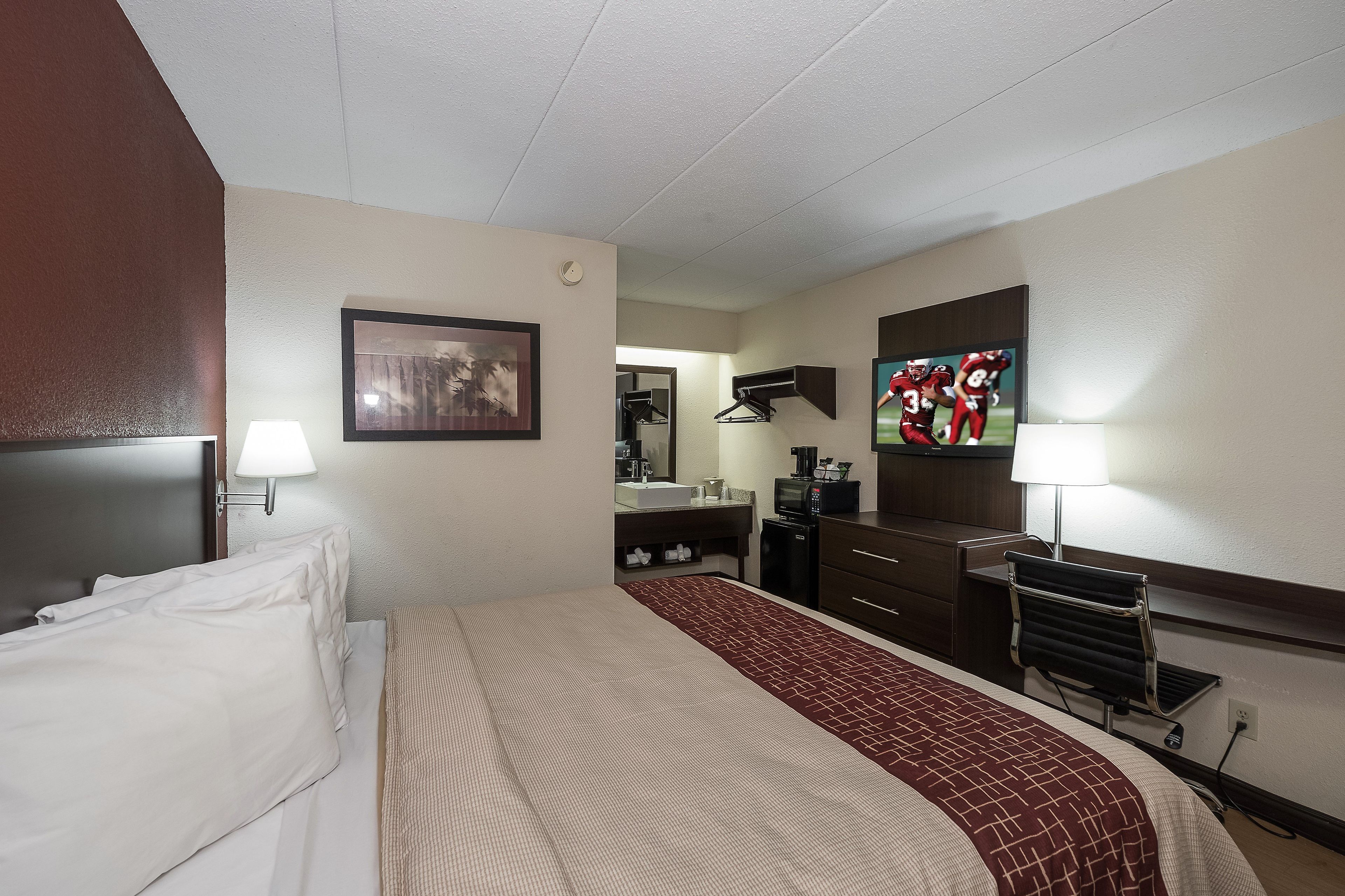 Deluxe Room, 1 King Bed, Non Smoking (First Floor) | Desk, laptop workspace, blackout drapes, cribs (free)