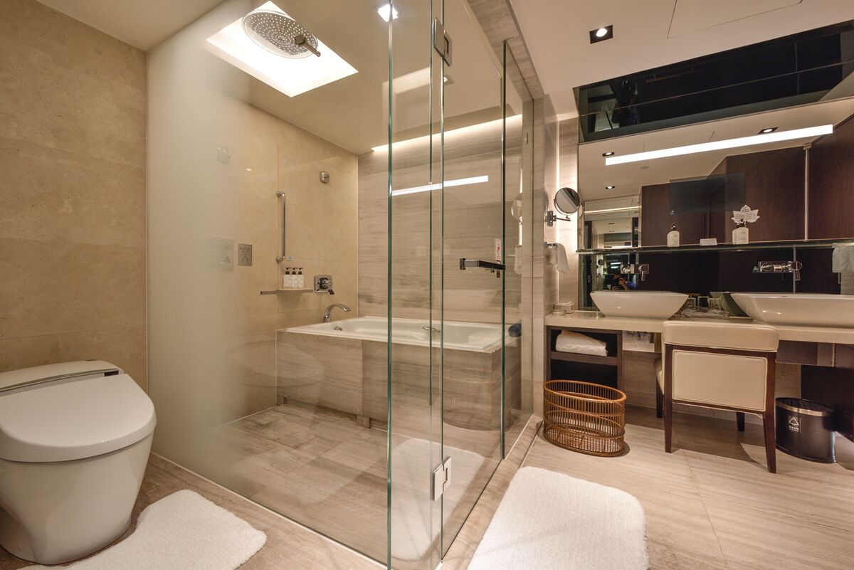 separate bathtub and shower, deep-soaking bathtub, designer toiletries