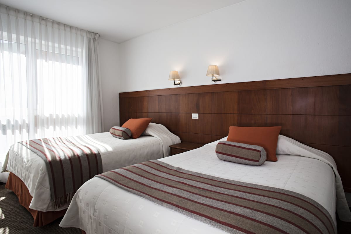 Premium bedding, down duvets, minibar, in-room safe