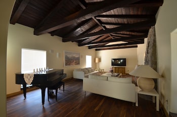 Exclusive Villa, Multiple Beds (Pickford Palms Ranch A-1, 6  mi from) | Living area | 40-inch flat-screen TV with cable channels, TV, DVD player at Miracle Springs Resort & Spa