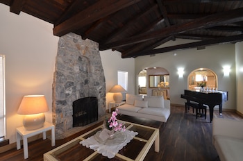Exclusive Villa, Multiple Beds (Pickford Palms Ranch A-1, 6  mi from) | Living area | 40-inch flat-screen TV with cable channels, TV, DVD player at Miracle Springs Resort & Spa